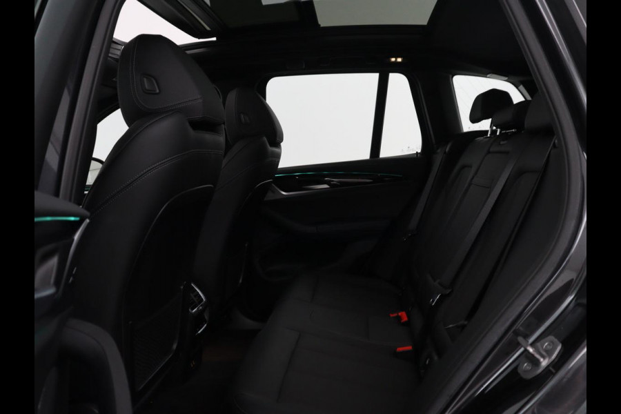BMW iX3 Executive 80 kWh | SOH 93,8% | Panoramadak | Leder | Stoelverwarming | Adaptive cruise | Carplay | Sfeerverlichting | Camera | Park assist | Elektrische achterklep | PHEV