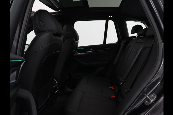 BMW iX3 Executive 80 kWh | SOH 93,8% | Panoramadak | Leder | Stoelverwarming | Adaptive cruise | Carplay | Sfeerverlichting | Camera | Park assist | Elektrische achterklep | PHEV