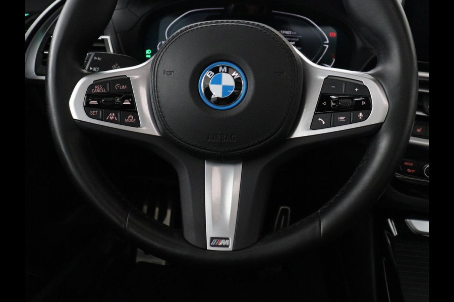 BMW iX3 Executive 80 kWh | SOH 93,8% | Panoramadak | Leder | Stoelverwarming | Adaptive cruise | Carplay | Sfeerverlichting | Camera | Park assist | Elektrische achterklep | PHEV