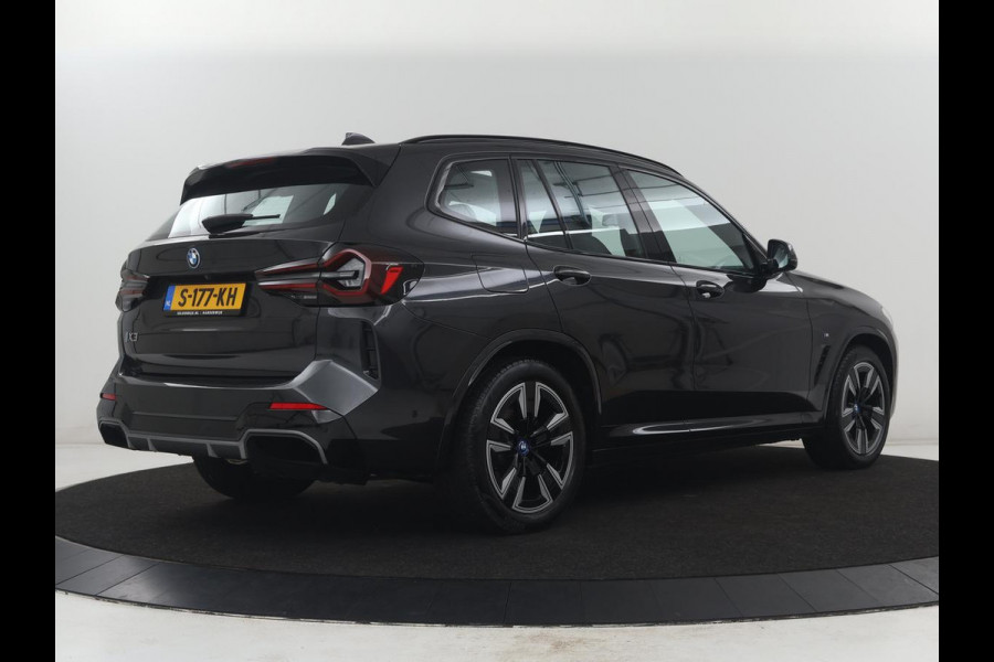 BMW iX3 Executive 80 kWh | SOH 93,8% | Panoramadak | Leder | Stoelverwarming | Adaptive cruise | Carplay | Sfeerverlichting | Camera | Park assist | Elektrische achterklep | PHEV