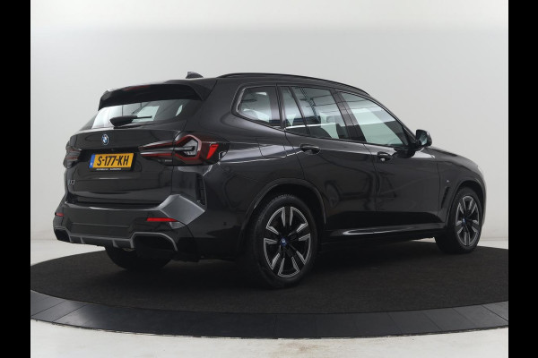 BMW iX3 Executive 80 kWh | SOH 93,8% | Panoramadak | Leder | Stoelverwarming | Adaptive cruise | Carplay | Sfeerverlichting | Camera | Park assist | Elektrische achterklep | PHEV