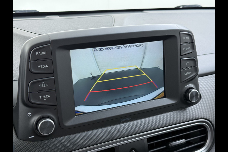 Hyundai Kona EV Comfort 64kWh 3-Fase Laden Warmtepomp Adap.Cruise SOH 100% Camera Navi* Apple Carplay Android Auto Ecc Pdc Keyless Lane Assist Bluetooth DAB Led FCA Origineel Nederlandse Auto