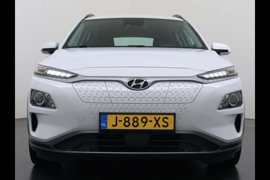 Hyundai Kona EV Comfort 64kWh 3-Fase Laden Warmtepomp Adap.Cruise SOH 100% Camera Navi* Apple Carplay Android Auto Ecc Pdc Keyless Lane Assist Bluetooth DAB Led FCA Origineel Nederlandse Auto