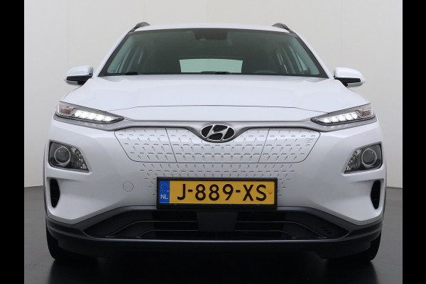 Hyundai Kona EV Comfort 64kWh 3-Fase Laden Warmtepomp Adap.Cruise SOH 100% Camera Navi* Apple Carplay Android Auto Ecc Pdc Keyless Lane Assist Bluetooth DAB Led FCA Origineel Nederlandse Auto