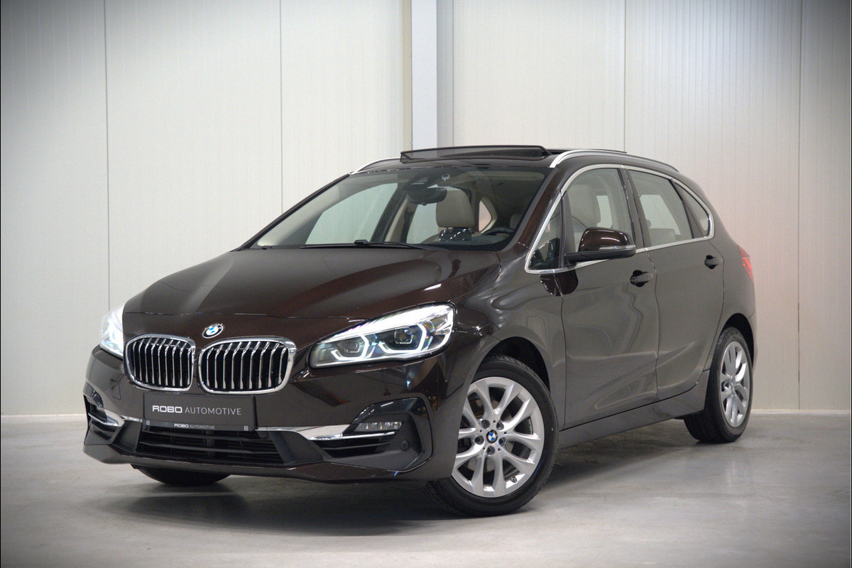 BMW 2 Serie Active Tourer 218i High Executive Luxury Line | Panoramadak | Stoelverwarming | Head-Up Display | Parkeersensoren | Navigatie | Trekhaak | Cruise Control | Climate Control | NAP