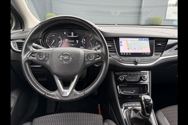 Opel Astra 1.2 Business Elegance 2e Eigenaar l Navi l Camera l Carplay l Keyless l Trekhaak l 110pk l Pdc V+A l Halfleder l 6 Bak l N.A.P l | Lm velgen l Rijstrooksensor l Apk tot 07-2027