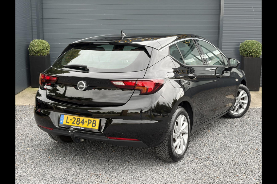 Opel Astra 1.2 Business Elegance 2e Eigenaar l Navi l Camera l Carplay l Keyless l Trekhaak l 110pk l Pdc V+A l Halfleder l 6 Bak l N.A.P l | Lm velgen l Rijstrooksensor l Apk tot 07-2027