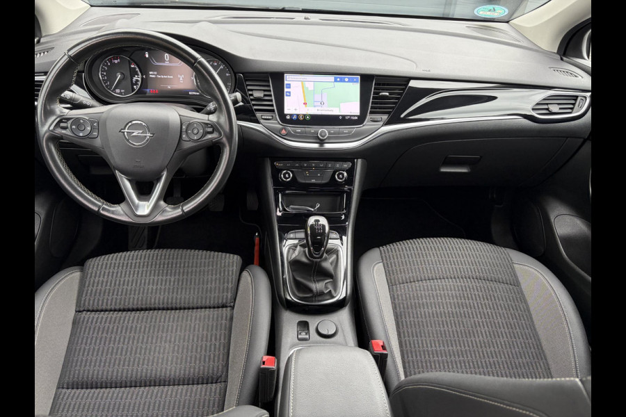 Opel Astra 1.2 Business Elegance 2e Eigenaar l Navi l Camera l Carplay l Keyless l Trekhaak l 110pk l Pdc V+A l Halfleder l 6 Bak l N.A.P l | Lm velgen l Rijstrooksensor l Apk tot 07-2027