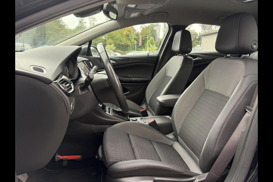 Opel Astra 1.2 Business Elegance 2e Eigenaar l Navi l Camera l Carplay l Keyless l Trekhaak l 110pk l Pdc V+A l Halfleder l 6 Bak l N.A.P l | Lm velgen l Rijstrooksensor l Apk tot 07-2027