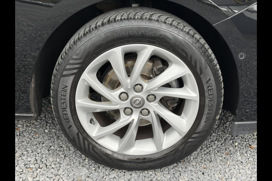 Opel Astra 1.2 Business Elegance 2e Eigenaar l Navi l Camera l Carplay l Keyless l Trekhaak l 110pk l Pdc V+A l Halfleder l 6 Bak l N.A.P l | Lm velgen l Rijstrooksensor l Apk tot 07-2027