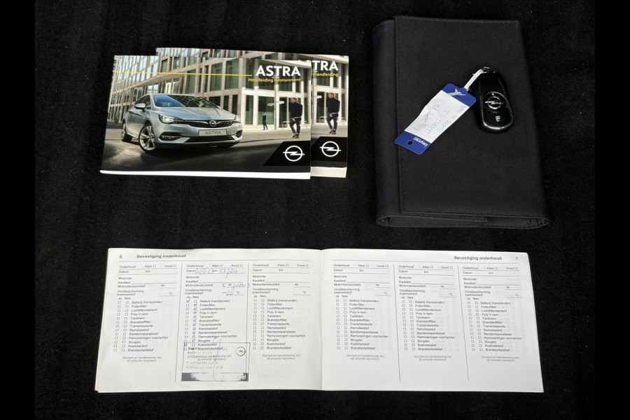 Opel Astra 1.2 Business Elegance 2e Eigenaar l Navi l Camera l Carplay l Keyless l Trekhaak l 110pk l Pdc V+A l Halfleder l 6 Bak l N.A.P l | Lm velgen l Rijstrooksensor l Apk tot 07-2027