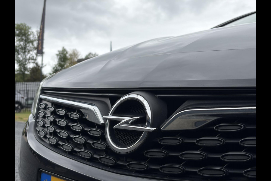 Opel Astra 1.2 Business Elegance 2e Eigenaar l Navi l Camera l Carplay l Keyless l Trekhaak l 110pk l Pdc V+A l Halfleder l 6 Bak l N.A.P l | Lm velgen l Rijstrooksensor l Apk tot 07-2027
