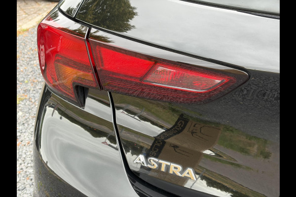 Opel Astra 1.2 Business Elegance 2e Eigenaar l Navi l Camera l Carplay l Keyless l Trekhaak l 110pk l Pdc V+A l Halfleder l 6 Bak l N.A.P l | Lm velgen l Rijstrooksensor l Apk tot 07-2027
