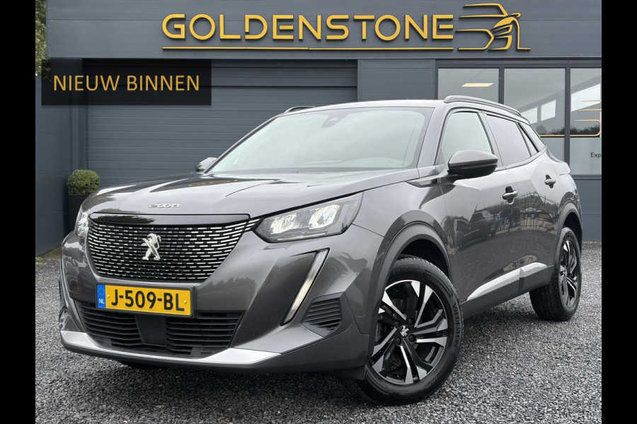 Peugeot 2008 1.2 PureTech Allure 2e Eigenaar l D-riem vv in 08/2024 l Camera360° l Draadloze telefoonlader l 131pk l Carplay l Navi l 6 Bak l Clima l Cruise l Halfleder l Keylss l 17'' Lmv l Pdc l N.A.P l Nieuwe Apk bij Aflevering