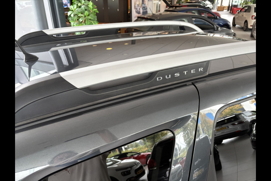 Dacia Duster 1.2 TCe Comfort Achteruitrijcamera - Airco - Navigatie - Trekhaak - Cruise control - Dakrails - Radio - Mistlampen voor - Start/stop systeem - Led verlichting - Elektrische ramen - Stuur multifunctioneel - Centrale vergrendeling met afstandsbediening - Bluetooth