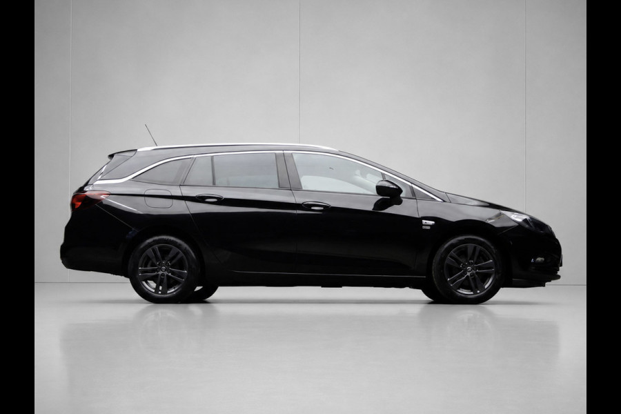 Opel Astra Sports Tourer 1.0 Turbo 120 Jaar Edition Sport (APPLE CARPLAY,NAVI,PDC,CLIMATE,CRUISE,GETINT,SPORTSTOELEN,LM VELGEN)