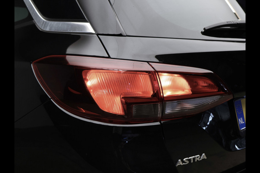 Opel Astra Sports Tourer 1.0 Turbo 120 Jaar Edition Sport (APPLE CARPLAY,NAVI,PDC,CLIMATE,CRUISE,GETINT,SPORTSTOELEN,LM VELGEN)