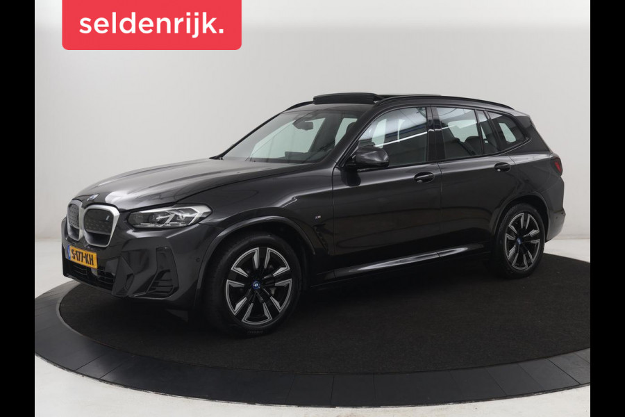 BMW iX3 Executive 80 kWh | SOH 93,8% | Panoramadak | Leder | Stoelverwarming | Adaptive cruise | Carplay | Sfeerverlichting | Camera | Park assist | Elektrische achterklep | PHEV