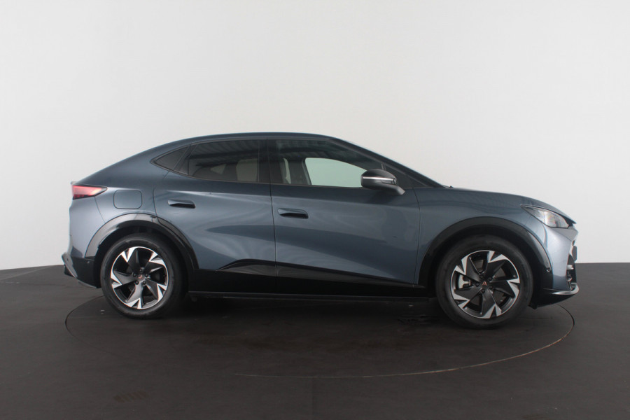 CUPRA Tavascan Business 82 kWh > 	569 WLTP/Travel Assist/Tavascan Blue