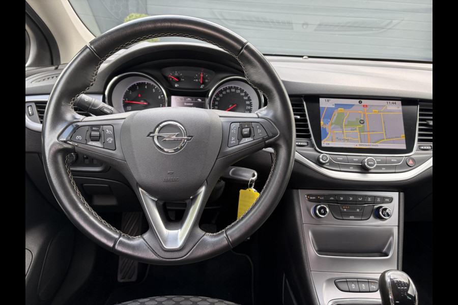 Opel Astra 1.0 Online Edition 2e Eigenaar l Carplay l Navi l Clima l Cruise l Pdc V+A l Lm velgen l N.A.P l Apk tot 05-2027