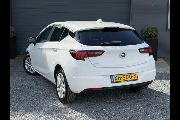 Opel Astra 1.0 Online Edition 2e Eigenaar l Carplay l Navi l Clima l Cruise l Pdc V+A l Lm velgen l N.A.P l Apk tot 05-2027