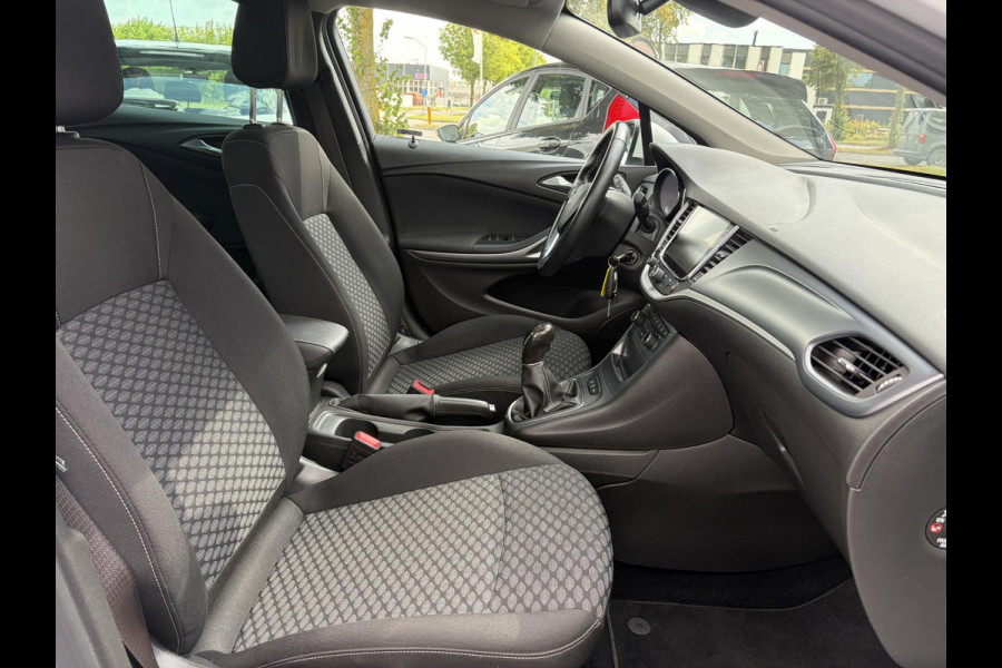 Opel Astra 1.0 Online Edition 2e Eigenaar l Carplay l Navi l Clima l Cruise l Pdc V+A l Lm velgen l N.A.P l Apk tot 05-2027