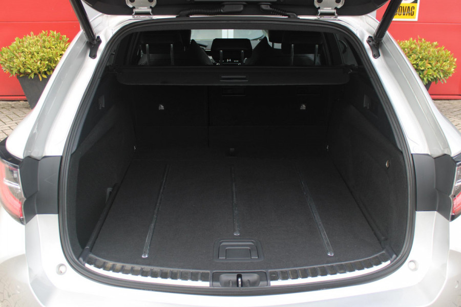 Toyota Corolla Touring Sports 2.0 Hybrid 180PK AUTOMAAT EXECUTIVE JBL | STOEL VERWARMING | DODEHOEK DETECTIE | NAVIGATIE | APPLE CARPLAY/ANDROID AUTO | CLIMATE CONTROL | ADAPTIVE CRUISE CONTROL | FULL LED KOPLAMPEN | KEYLESS ENTRY/START | ALL SEASON BANDEN | 18" LICHTMETALEN VELGEN | DAB+ RADIO | JBL AUDIO SSTEM | ELEKTRISCH BEDIENBARE ACHTERKLEP | ACHTERUITRIJ CAMERA | PARKEERSENSOREN VOOR + ACHTER | DRAADLOZE TELEFOONLADER | HEAD UP DISPLAY |