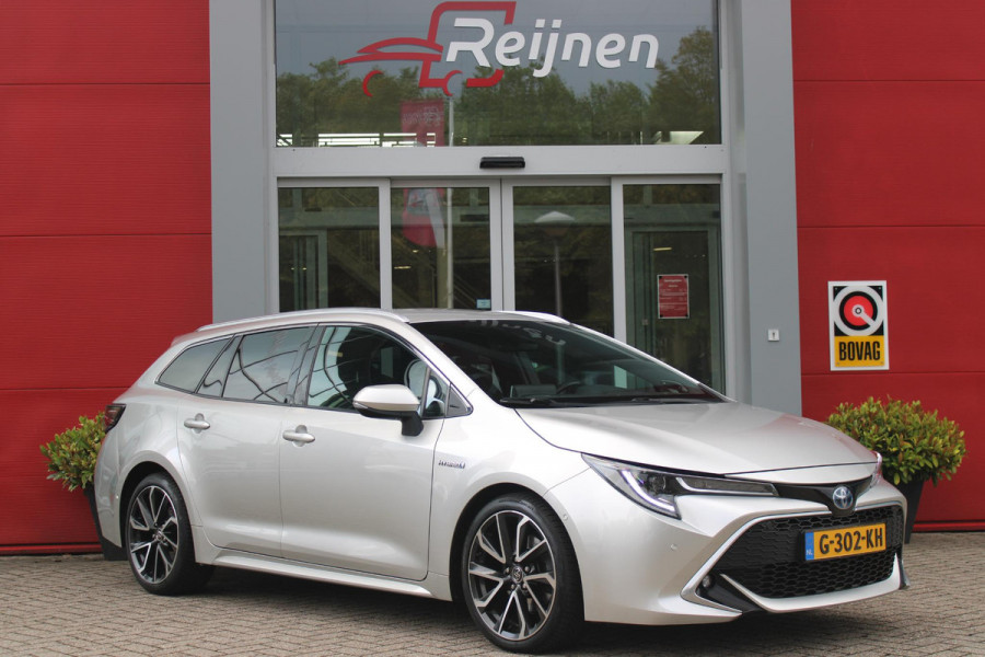 Toyota Corolla Touring Sports 2.0 Hybrid 180PK AUTOMAAT EXECUTIVE JBL | STOEL VERWARMING | DODEHOEK DETECTIE | NAVIGATIE | APPLE CARPLAY/ANDROID AUTO | CLIMATE CONTROL | ADAPTIVE CRUISE CONTROL | FULL LED KOPLAMPEN | KEYLESS ENTRY/START | ALL SEASON BANDEN | 18" LICHTMETALEN VELGEN | DAB+ RADIO | JBL AUDIO SSTEM | ELEKTRISCH BEDIENBARE ACHTERKLEP | ACHTERUITRIJ CAMERA | PARKEERSENSOREN VOOR + ACHTER | DRAADLOZE TELEFOONLADER | HEAD UP DISPLAY |