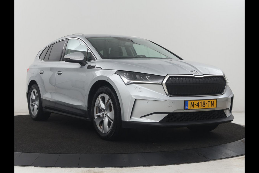 Škoda Enyaq iV 80 | SOH 92,1% | Memory | Half leder | Stuur/stoel verwarming | Adaptive cruise | Lane assist | Dode hoek | Carplay | Sfeer verlichting | Camera | Climate control | Elektrische achterklep
