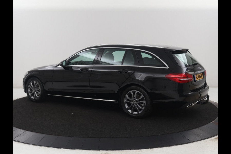 Mercedes-Benz C-Klasse Estate 180 Business Solution | Half leder | Stoelverwarming | Navigatie | Bluetooth | Camera | Park assist | Cruise control | Climate control | Elektrische achterklep | Trekhaak