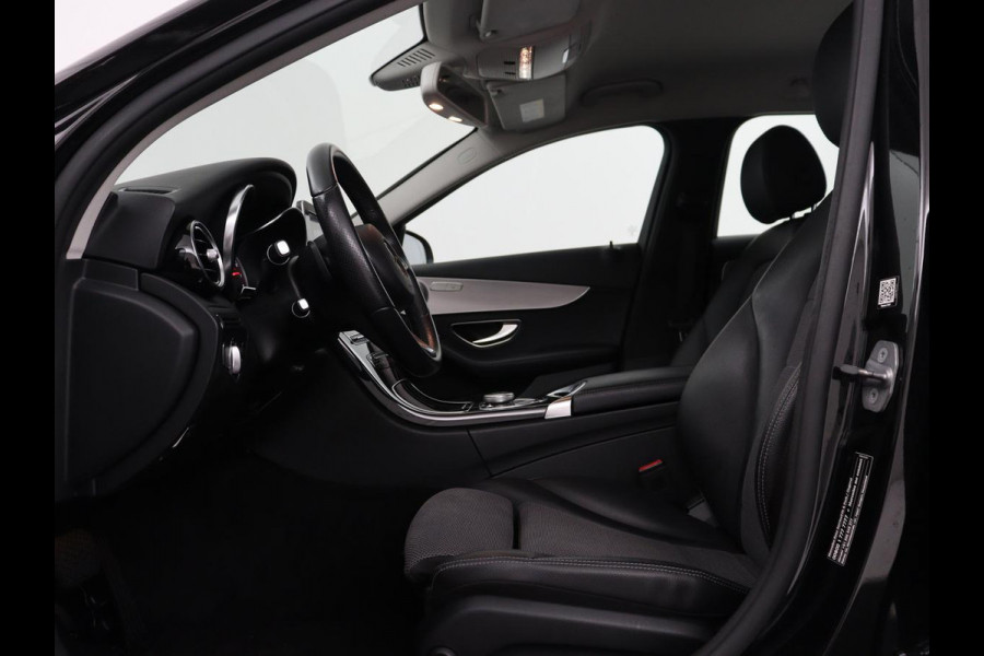 Mercedes-Benz C-Klasse Estate 180 Business Solution | Half leder | Stoelverwarming | Navigatie | Bluetooth | Camera | Park assist | Cruise control | Climate control | Elektrische achterklep | Trekhaak
