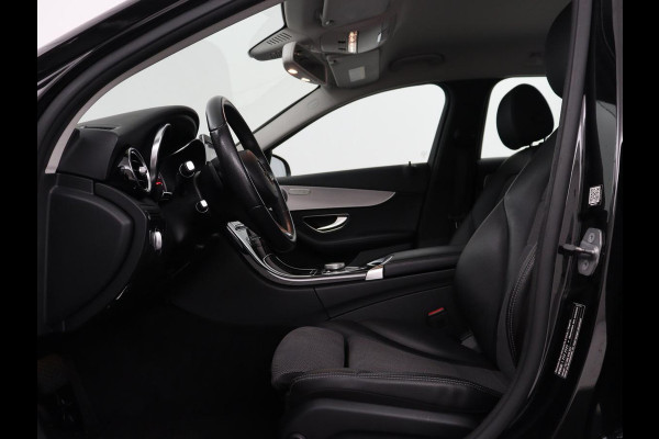 Mercedes-Benz C-Klasse Estate 180 Business Solution | Half leder | Stoelverwarming | Navigatie | Bluetooth | Camera | Park assist | Cruise control | Climate control | Elektrische achterklep | Trekhaak