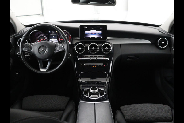 Mercedes-Benz C-Klasse Estate 180 Business Solution | Half leder | Stoelverwarming | Navigatie | Bluetooth | Camera | Park assist | Cruise control | Climate control | Elektrische achterklep | Trekhaak