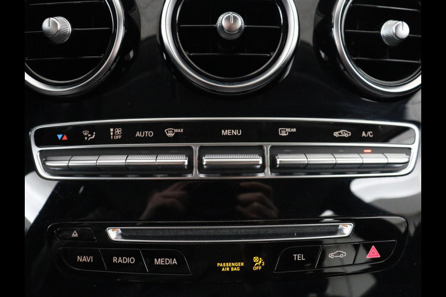 Mercedes-Benz C-Klasse Estate 180 Business Solution | Half leder | Stoelverwarming | Navigatie | Bluetooth | Camera | Park assist | Cruise control | Climate control | Elektrische achterklep | Trekhaak