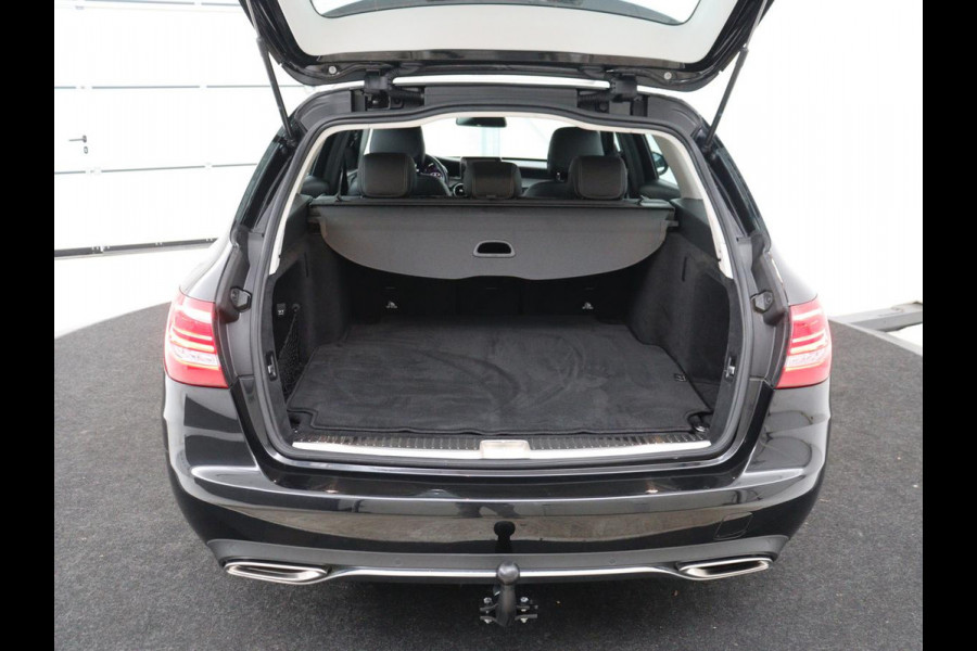 Mercedes-Benz C-Klasse Estate 180 Business Solution | Half leder | Stoelverwarming | Navigatie | Bluetooth | Camera | Park assist | Cruise control | Climate control | Elektrische achterklep | Trekhaak