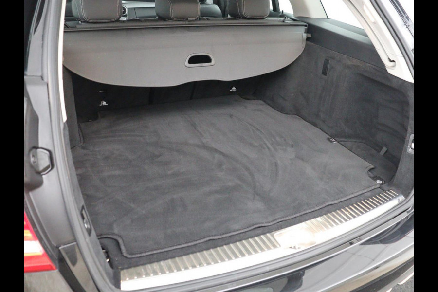 Mercedes-Benz C-Klasse Estate 180 Business Solution | Half leder | Stoelverwarming | Navigatie | Bluetooth | Camera | Park assist | Cruise control | Climate control | Elektrische achterklep | Trekhaak