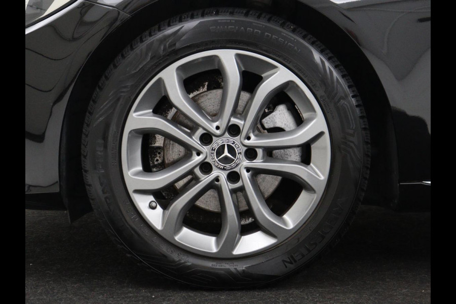 Mercedes-Benz C-Klasse Estate 180 Business Solution | Half leder | Stoelverwarming | Navigatie | Bluetooth | Camera | Park assist | Cruise control | Climate control | Elektrische achterklep | Trekhaak