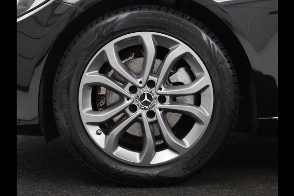 Mercedes-Benz C-Klasse Estate 180 Business Solution | Half leder | Stoelverwarming | Navigatie | Bluetooth | Camera | Park assist | Cruise control | Climate control | Elektrische achterklep | Trekhaak