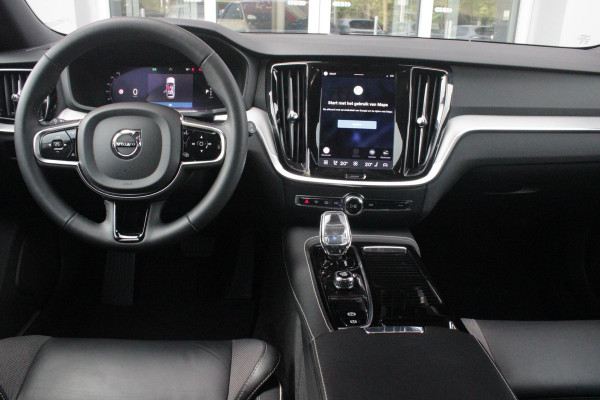 Volvo V60 2.0 T6 Plug-in hybrid 350PK AWD PLUS DARK | LONG RANGE | PANORAMISCH SCHUIF/KANTELDAK | NAVIGATIE VIA GOOGLE AUTO | APPLE CARPLAY / ANDROID AUTO | FULL-LED KOPLAMPEN | 125319" 6-SPAAKS BLACK / DIAMOND CUT VELGEN | LEDEREN BEKLEDING | POWER SEATS - BESTUURDERS- EN PASSAGIERSSTOEL ELEKTRISCHVERSTELBAAR MET GEHEUGEN, ELEKTRISCH VERSTELBARE  ZITVERLENGERS /LENDESTEUN VIERVOUDIG | STOEL- EN ACHTERBANKVERWARMING | STUURVERWARMING | PARKEERVERWARMING MET TIMER (STANDKACHEL) | ACHTERUIRIJ CAMERA | EXTRA GETINTE ACHTERRUITEN | ELEKTRISCH BEDIENBARE ACHTERKLEP | ELEKTRISCH INKLA