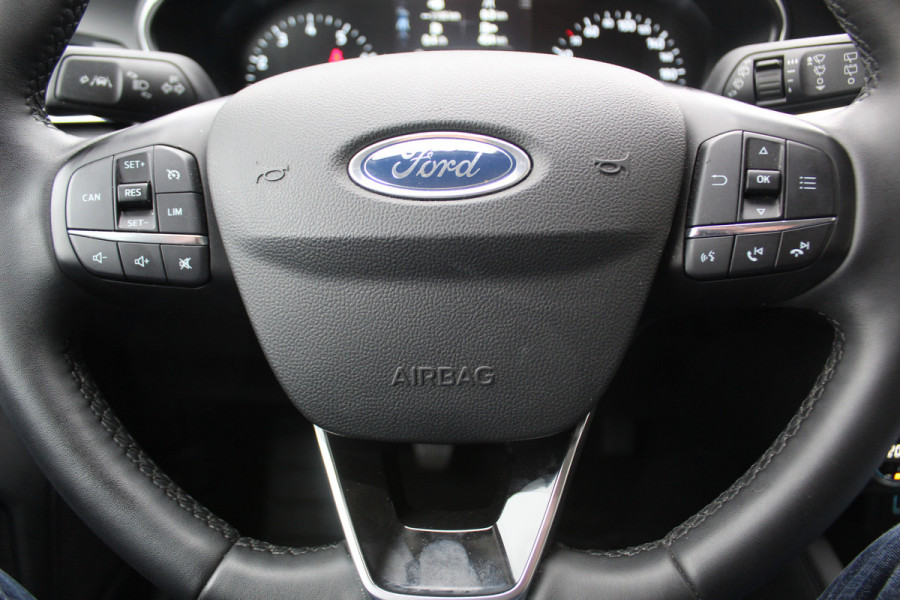 Ford FOCUS Wagon 1.0-125pk EcoBoost Mild-hybrid Titanium. Mooie, ruime, luxe en comfortabele Ford Focus wagon. Volautm. airco dual, camera, easy entry/easy go, stoel-, stuur- en voorraamverw., cruise control, Isofix, side- en lane assist, parkeersensoren v+a, LM wielen etc.