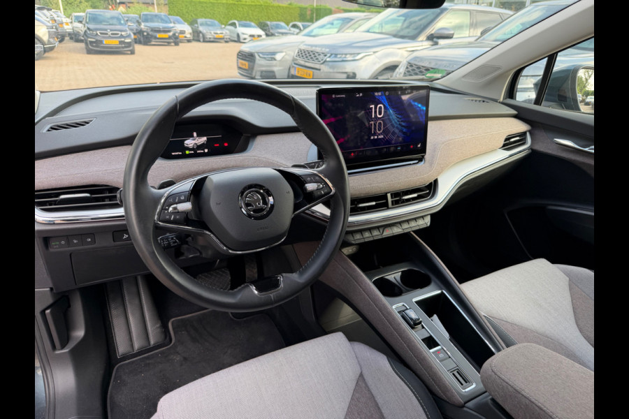 Škoda ENYAQ iV 60 First Edition / SoH 93,1% / Camera / CarPlay / Keyless / Matrix LED / 20'' / Dodehoek / Stoelverwarming / DAB / ACC