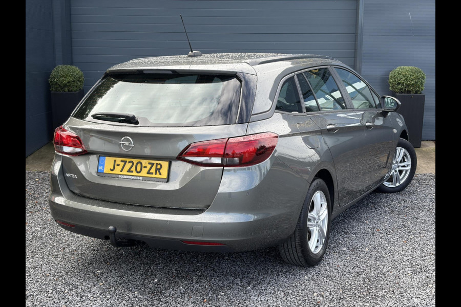 Opel Astra 1.2 Business Edition 147pk l 2e Eigenaar l Trekhaak l Navi l Carplay l 6 Bak l Clima l Cruise l Pdc V+A l Recent beurt gehad l Lm velgen l N.A.P l Apk tot 07-2028