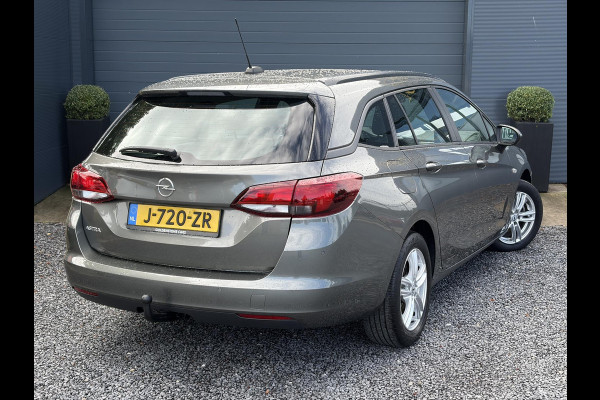 Opel Astra 1.2 Business Edition 147pk l 2e Eigenaar l Trekhaak l Navi l Carplay l 6 Bak l Clima l Cruise l Pdc V+A l Recent beurt gehad l Lm velgen l N.A.P l Apk tot 07-2028
