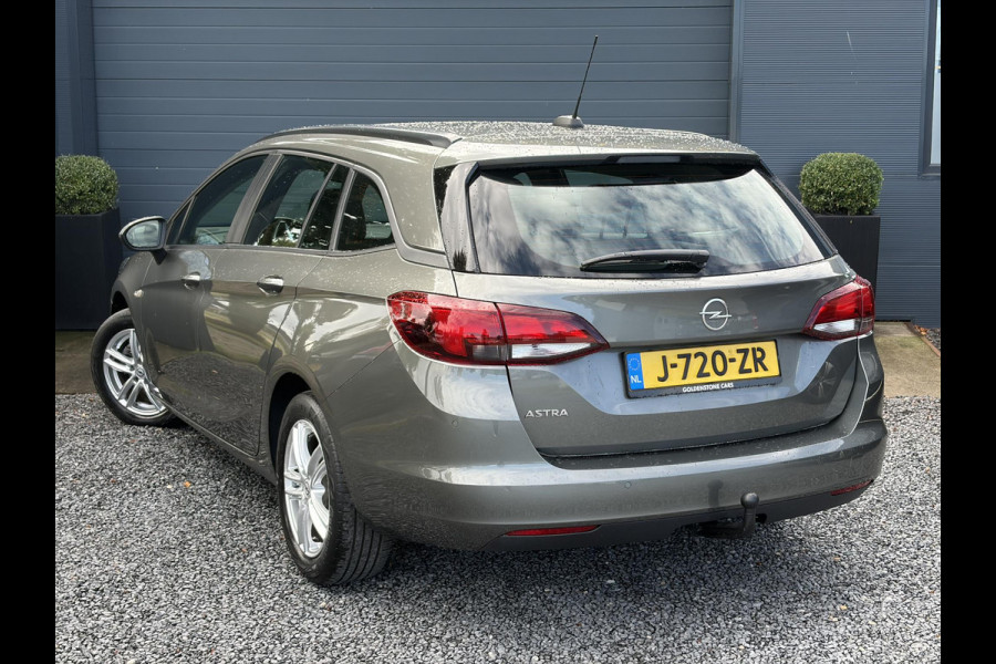 Opel Astra 1.2 Business Edition 147pk l 2e Eigenaar l Trekhaak l Navi l Carplay l 6 Bak l Clima l Cruise l Pdc V+A l Recent beurt gehad l Lm velgen l N.A.P l Apk tot 07-2028