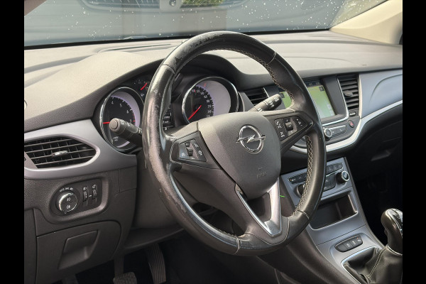 Opel Astra 1.2 Business Edition 147pk l 2e Eigenaar l Trekhaak l Navi l Carplay l 6 Bak l Clima l Cruise l Pdc V+A l Recent beurt gehad l Lm velgen l N.A.P l Apk tot 07-2028