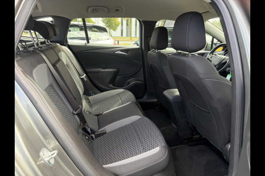 Opel Astra 1.2 Business Edition 147pk l 2e Eigenaar l Trekhaak l Navi l Carplay l 6 Bak l Clima l Cruise l Pdc V+A l Recent beurt gehad l Lm velgen l N.A.P l Apk tot 07-2028
