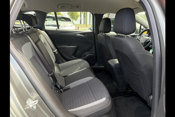 Opel Astra 1.2 Business Edition 147pk l 2e Eigenaar l Trekhaak l Navi l Carplay l 6 Bak l Clima l Cruise l Pdc V+A l Recent beurt gehad l Lm velgen l N.A.P l Apk tot 07-2028