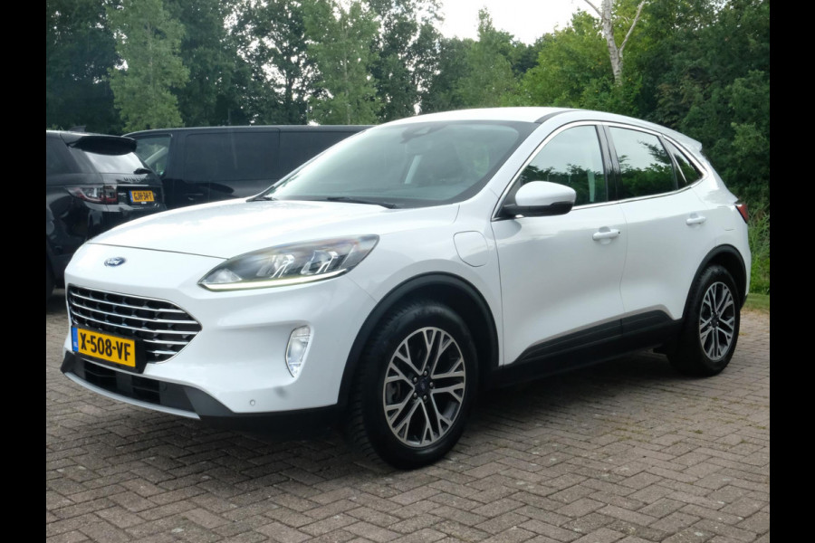 Ford Kuga 2.5 PHEV Titanium 224 PK | Winterpack | Stoelverwarming | Navigatie | Parkeersensoren | CarPlay | Climate Control