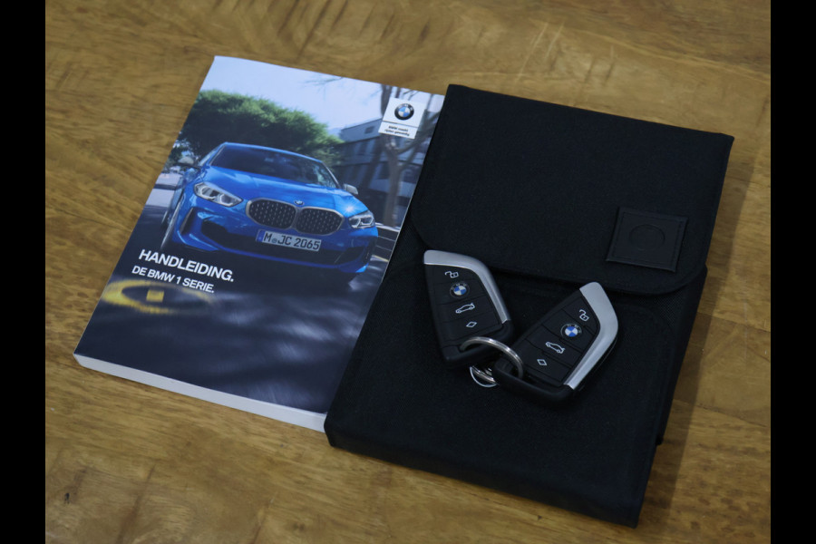 BMW 1-serie 118i Executive Edition [AFNEEMBARE TREKHAAK, APPLE CARPLAY, ANDROID, SPORTSTOELEN, PDC V+A, BMW LED, CRUISE, CLIMATE, NIEUWSTAAT]