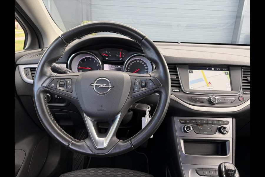 Opel Astra Sports Tourer 1.2 Edition ✓Camera ✓110pk✓2e Eigenaar✓Carplay✓Navi✓Airco✓Cruise✓Pdc✓LED koplampen✓N.A.P.✓6 Bak✓Pdc V+A✓Lm velgen✓Dakdragers ✓Comfortstoelen✓Bj 11-2020✓Apk tot 07-2028
